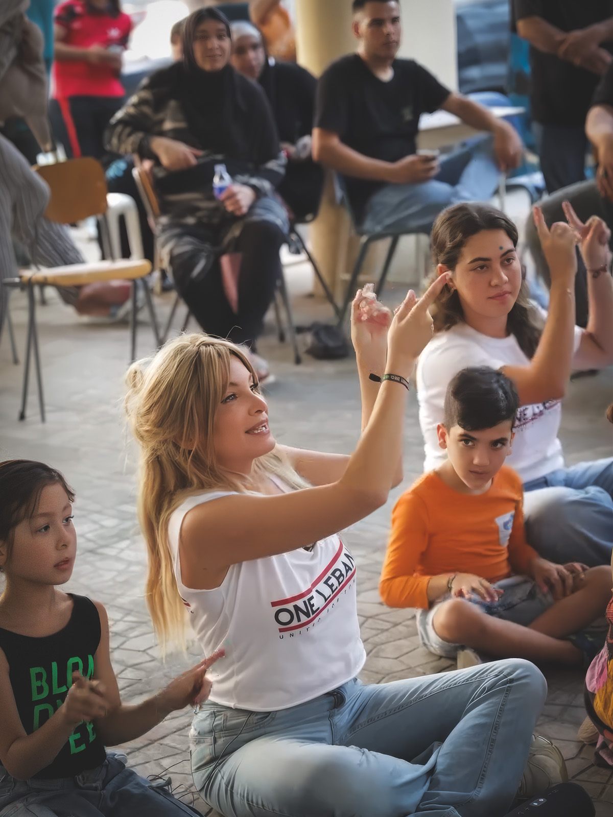 One Lebanon — Tania Kassis at a unity and coexistence gathering.